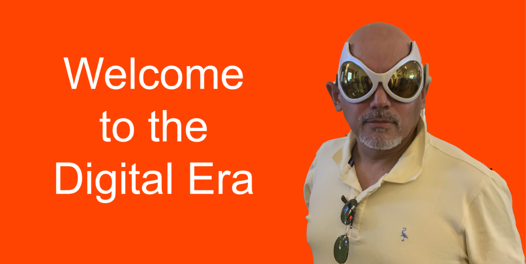 A picture of Charles Araujo wearing goofy alien glasses beside text that reads 'Welcome to the Digital Era'
